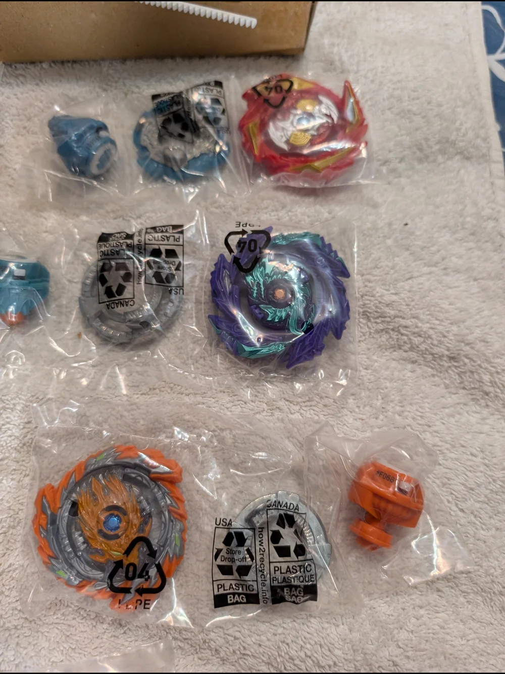 Hasbro Beyblader Blue Turbo Launcher and Assorted Burst Spinners